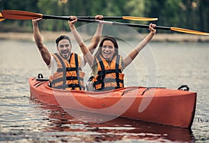 Couple travelling by kayak