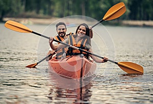 Couple travelling by kayak