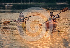 Couple travelling by kayak