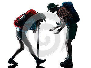 Couple trekker trekking tired silhouette