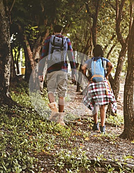 Couple trekking in a park