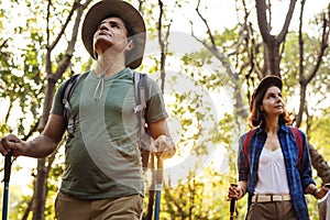 Couple trekking together in a forest