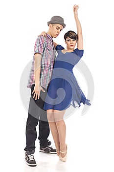 Couple of two dancers, woman on pointes, man with hat , on white background