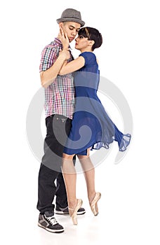 Couple of two dancers, woman on pointes, man with hat , on white background