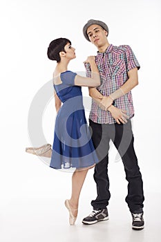 Couple of two dancers, woman on pointes, man with hat , on white background