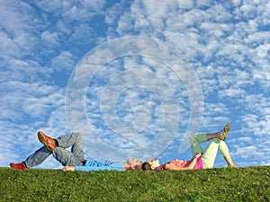 Couple under cloudfield photo