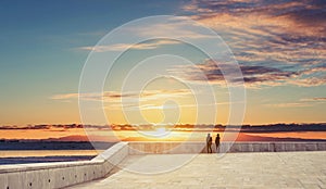 Couple under sunset sky in summer