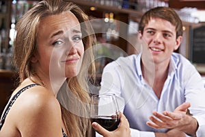 Couple On Unsuccessful Blind Date In Restaurant photo