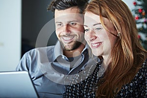 Couple use or watch something on tablet pc