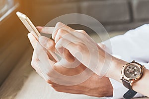 Couple using smartphone in coffee shop