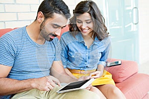 Couple using tablet