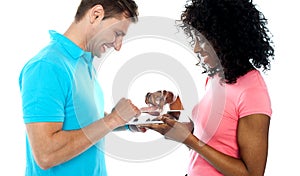 Couple using wireless touch pad device