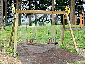 Couple of vacant swings playground