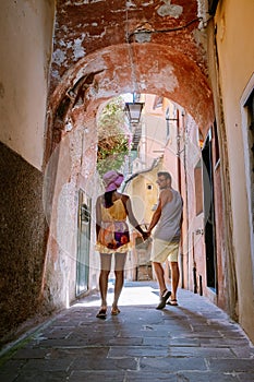 Couple on vacation ligurian coast Italy, Portofino famous village bay, Italy colorful village Ligurian coast