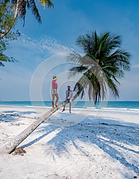 couple on vacation in Thailand, Chumpon province , white tropical beach palm trees, Wua Laen beach