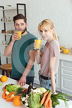 couple of vegans drinking fresh juice