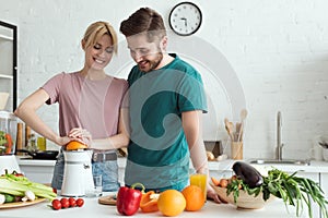 couple of vegans preparing fresh juice