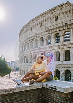 Couple visit the Colosseum in Rome at a citytrip in Rome Italy, Europe