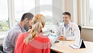 Couple visiting doctor at family planning clinic