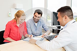 Couple visiting doctor at family planning clinic