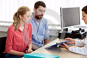 Couple visiting doctor at family planning clinic