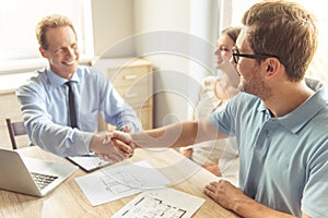 Couple visiting realtor