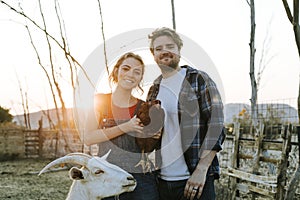 Couple volunteering at an animal sanctuary