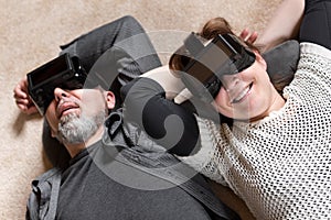 Couple with vr glasses, downview photo