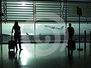 Couple waiting at the airport photo