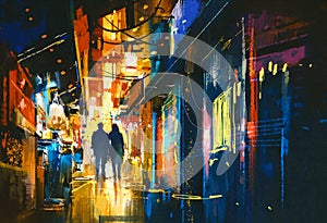 Couple walking in alley with colorful lights photo