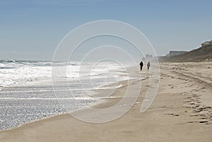 Couple Walking on Beach