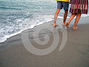 Couple walking on beach