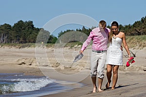 Couple walking on beach