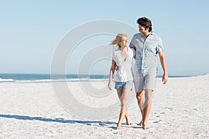 Couple walking at beach