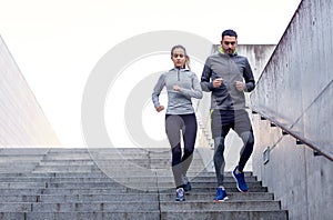 Couple walking downstairs on stadium