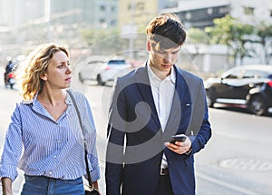 Couple walking on downtown together