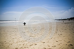 Couple walking kuta beach bali