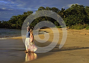 Couple walking on a maui beach