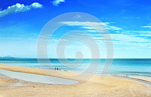 Couple walking relaxing on beach Huahin