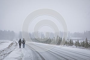 Couple walking in winter landscape