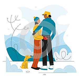 Couple walks winter park. Snowy cold weather, family walking with dog, people in love stands and hugs, frosty landscape