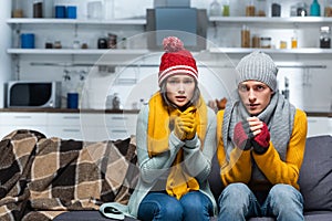 Couple in warm hats and gloves photo