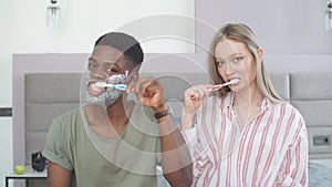 Couple washing teeth in morning, dental hygiene is important