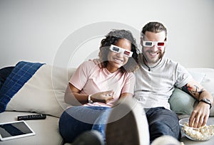 Couple watching 3D movie together