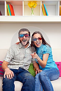 Couple watching comedy and laughing