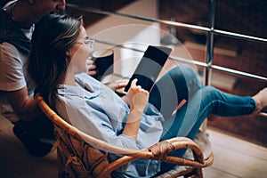 Couple watching something on tablet device