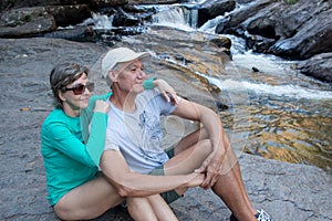 Couple at a Waterfall