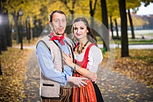 Couple wearing Dirndl and Lederhose