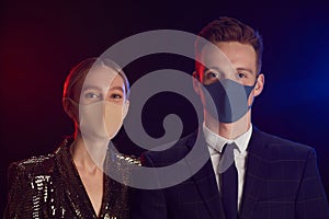 Couple Wearing Masks at Party