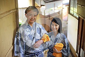 A couple wearing a smiling yukata